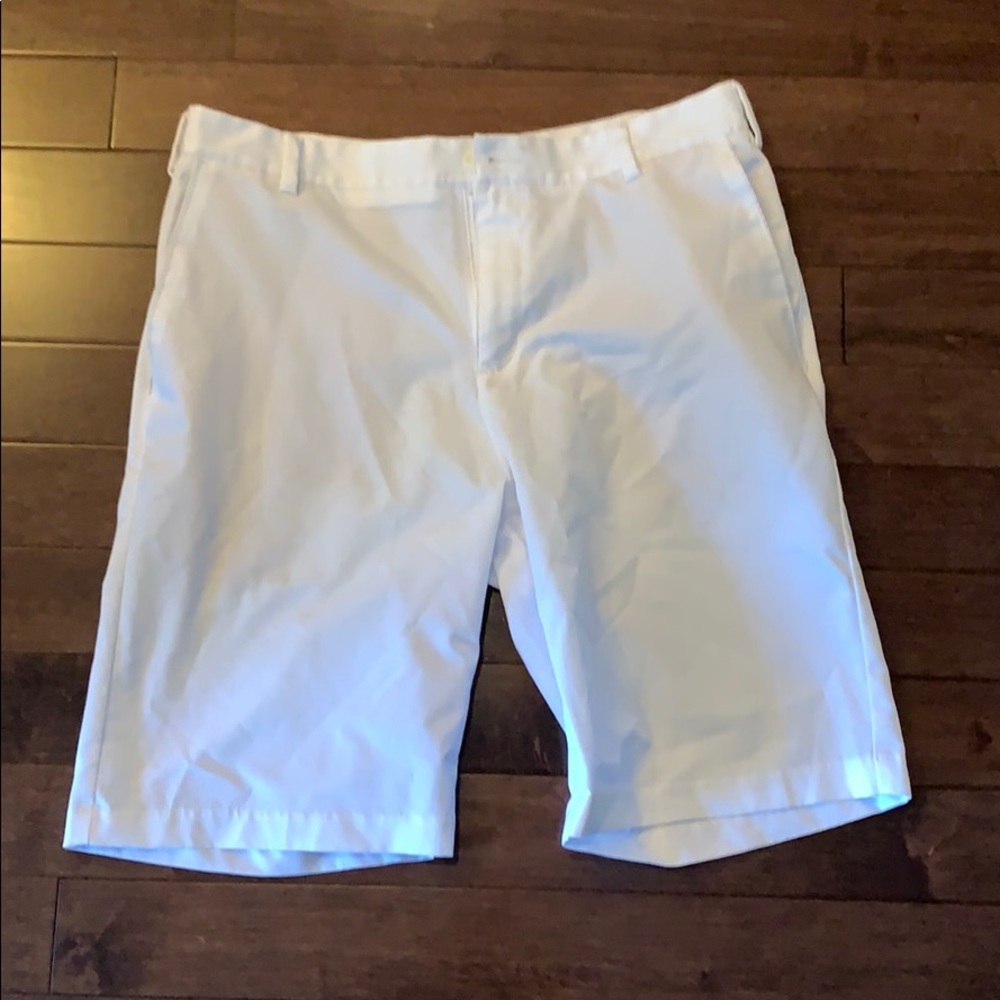 White mens golf shorts.